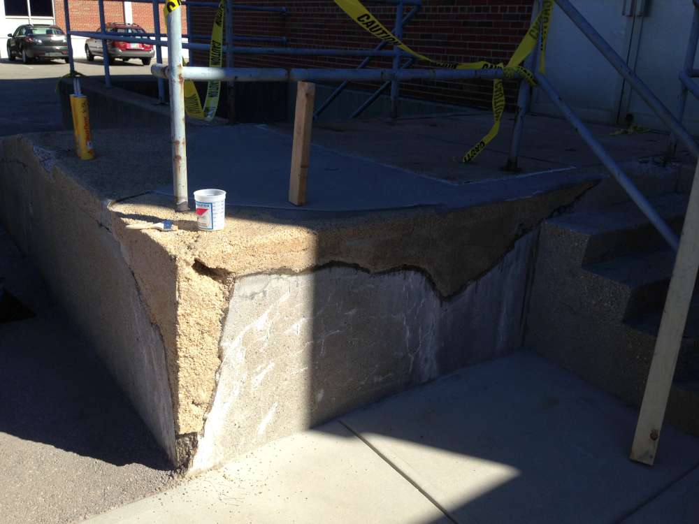 Wood supports removed, showing the restored dock corner and edge.