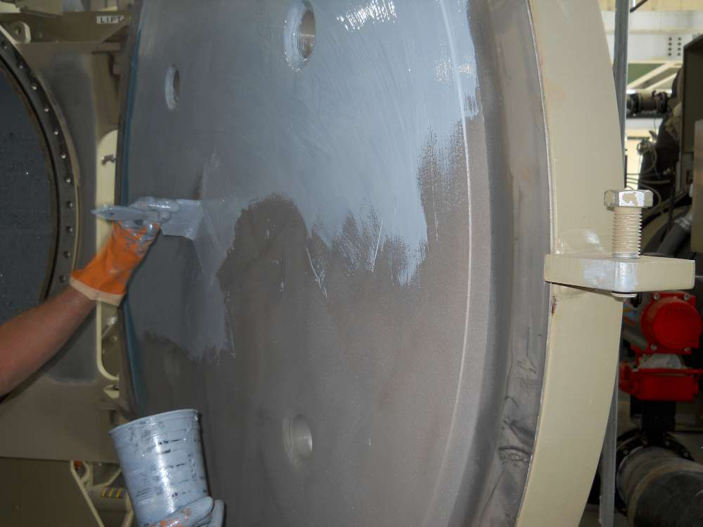 End cover door coated separately from the internals, allowing both halves of each unit to be worked in parallel.