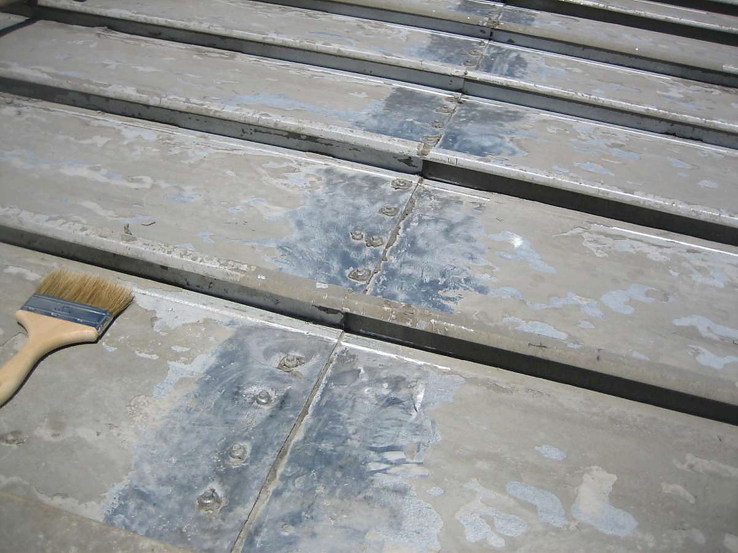 Packing area roof leaking at seams and fastener rows