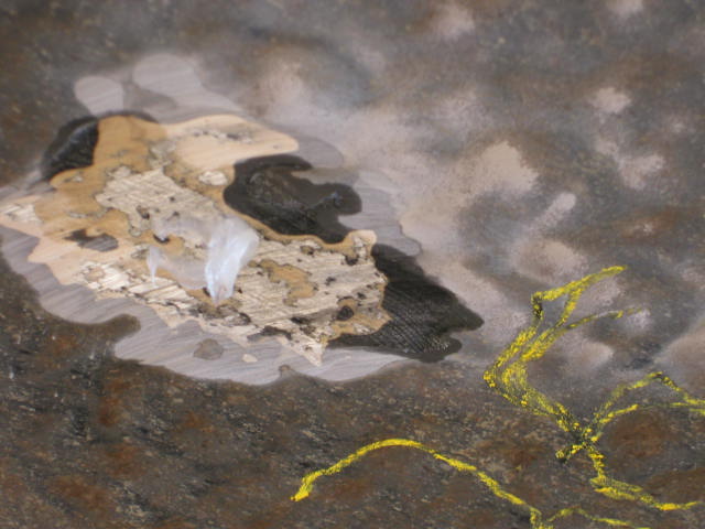 Before: previous coating disbonded from the pitted steel substrate.