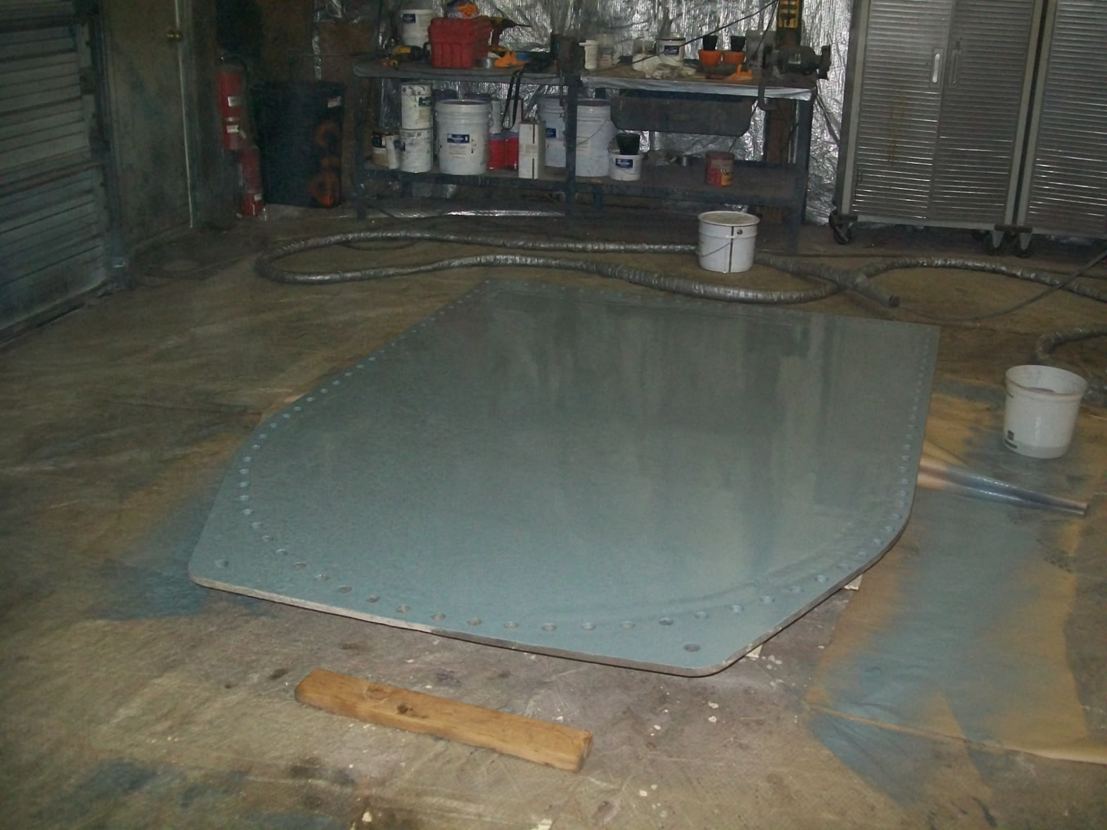 Coating on the reverse side of the door plate.