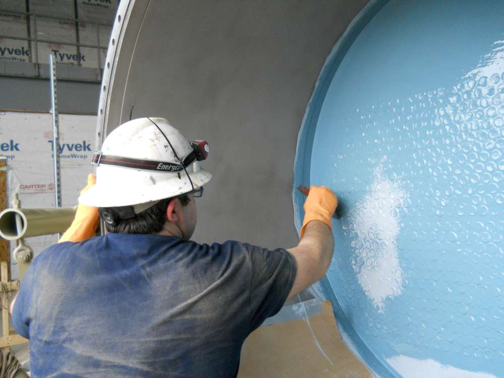 Second coat: blue top coat applied over the gray base for verifiable full coverage.