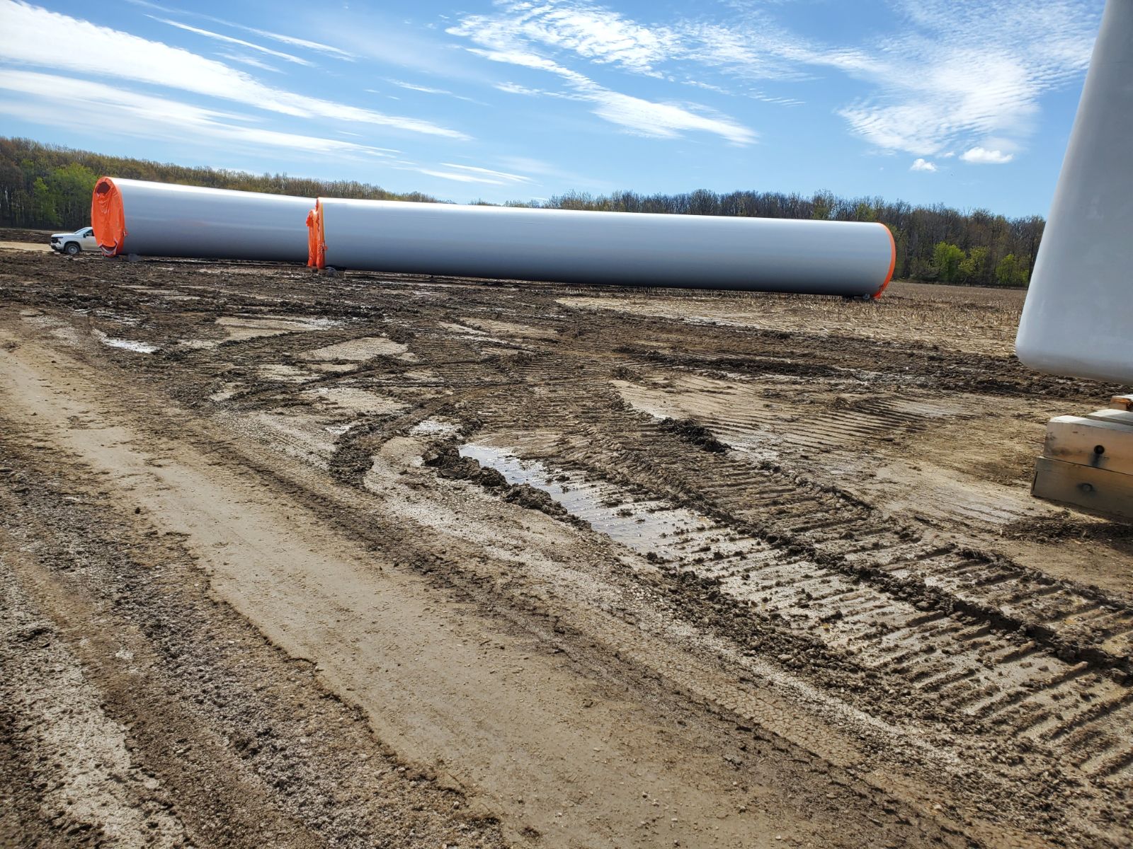 Wind turbine tower sections laid out on site during a Belzona training