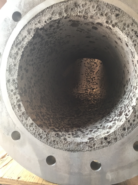 Before: heavily pitted suction bore and flange face.