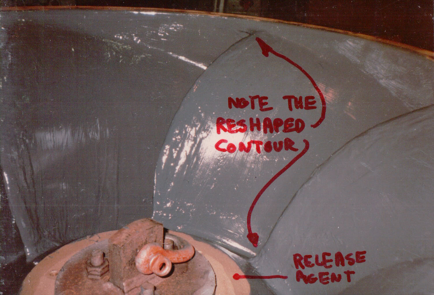 Reshaped vane contour formed against a release agent.