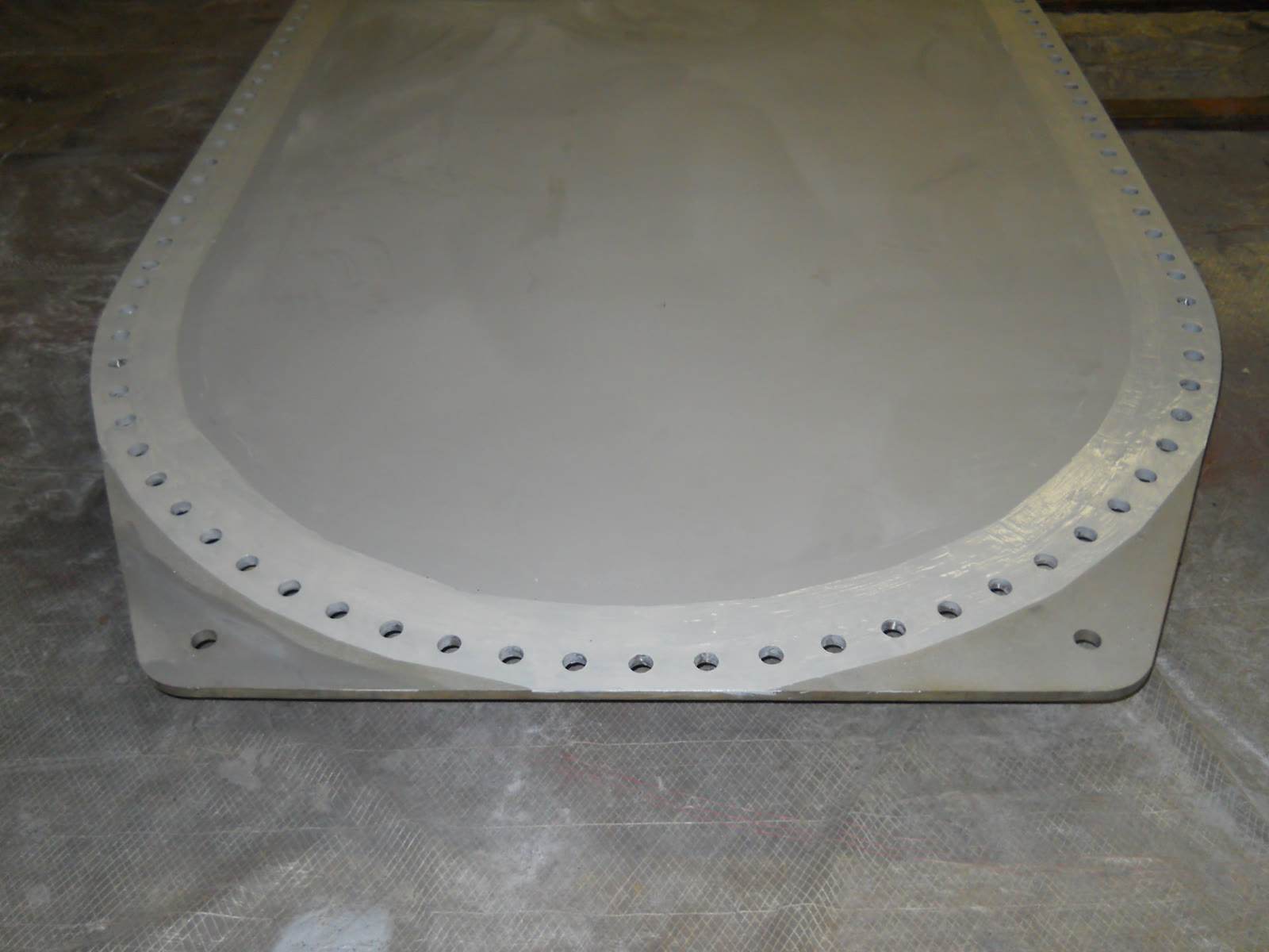 Coating in progress on the door plate.