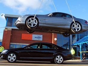 A Mercedes SL500 AMG suspended above a Mercedes S320 LCDI using Belzona 1251 (HA-Metal)