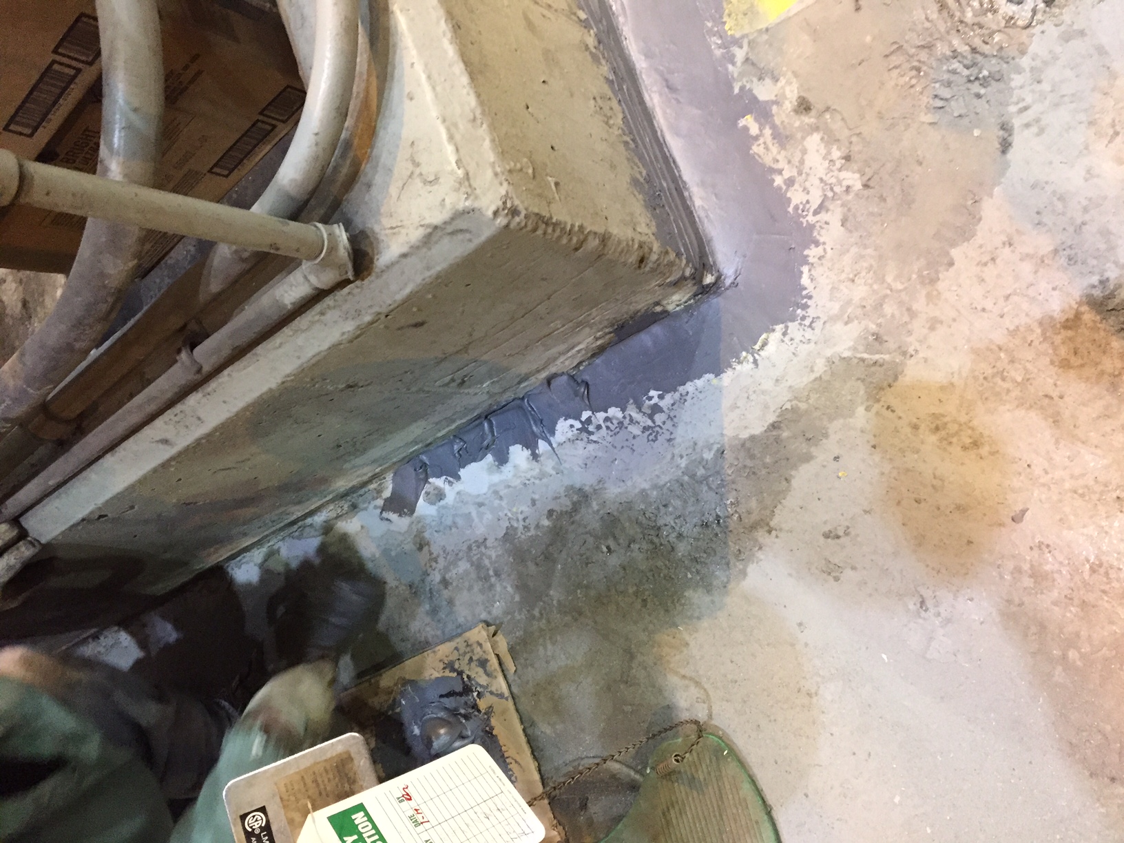 Containment area base sealed with grey Belzona repair material