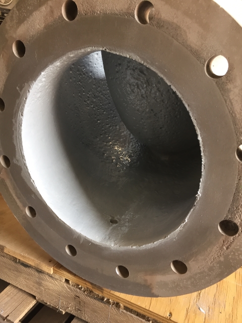 After: suction bore and flange face rebuilt and coated.