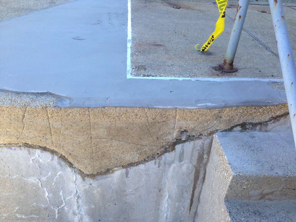 Belzona 4111 topcoat being applied over the rebuilt area.