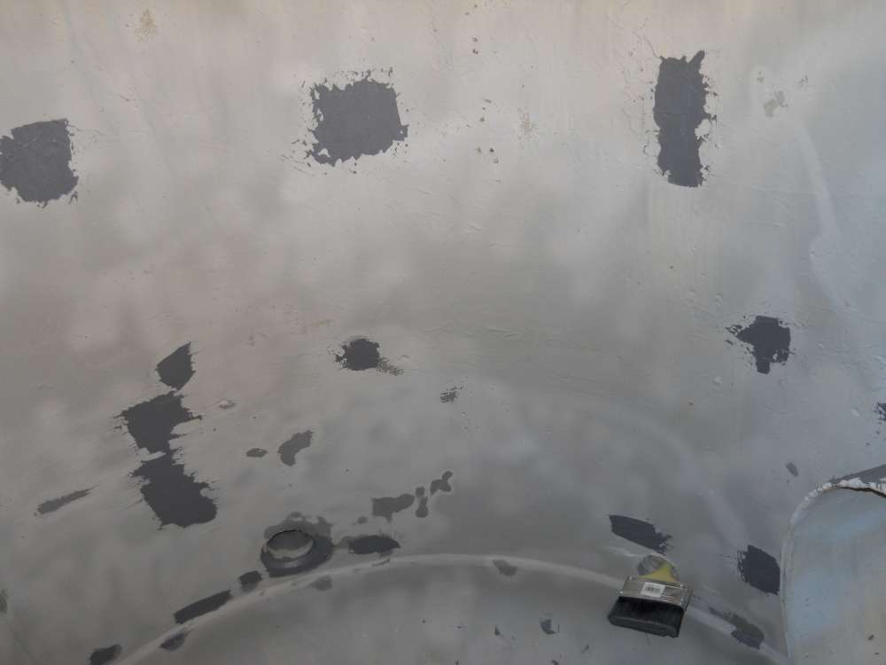 Application in progress: Belzona 5892 lining going on over the repaired interior.