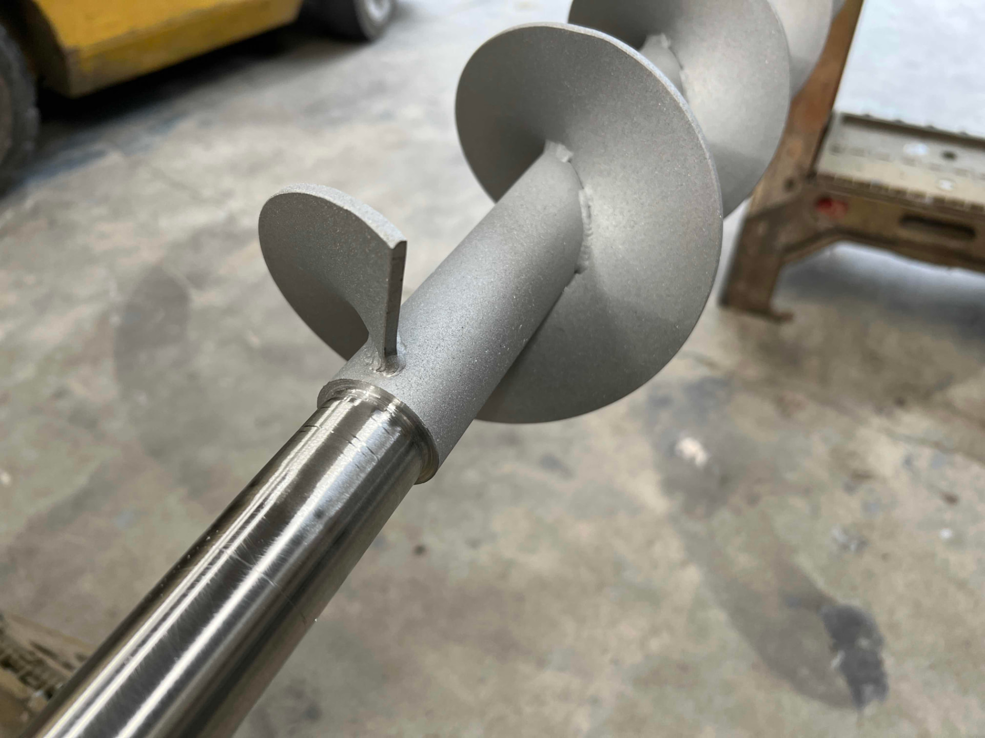 Surface prep: the application area bead blasted to create a bonding profile.